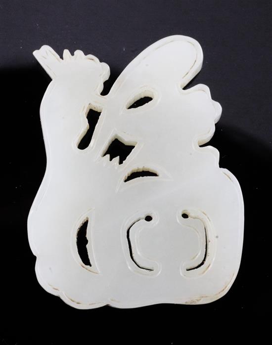 A Chinese pale celadon jade carving of the character Fu, early 20th century, 4.7cm